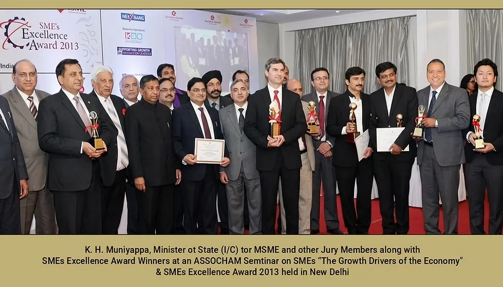 Award winners and jury members standing in a row on stage